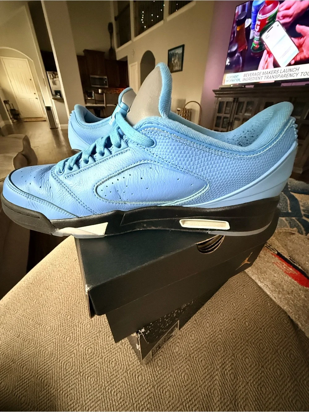 Jordan Men’s Retro Low-Top Sneakers in UNC University Light Blue and Black